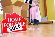 Sold sign with boxes