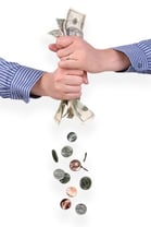 Hands wringing money