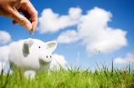 Piggy bank with sunny sky
