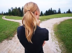 Woman at crossroads