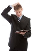 Man scratching his head