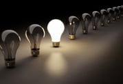 light bulb among dark bulbs