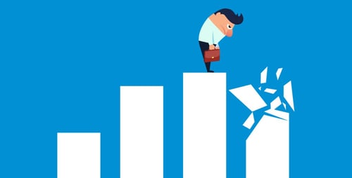 businessman-sad-at-slowing-growth-bar-chart