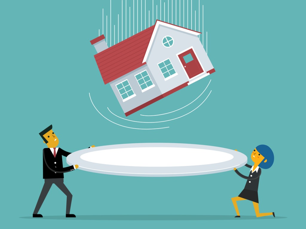 man-and-woman-catching-a-falling-home-on-a-trampoline