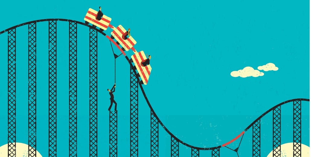 man-supporting-weight-of-plunging-roller-coaster