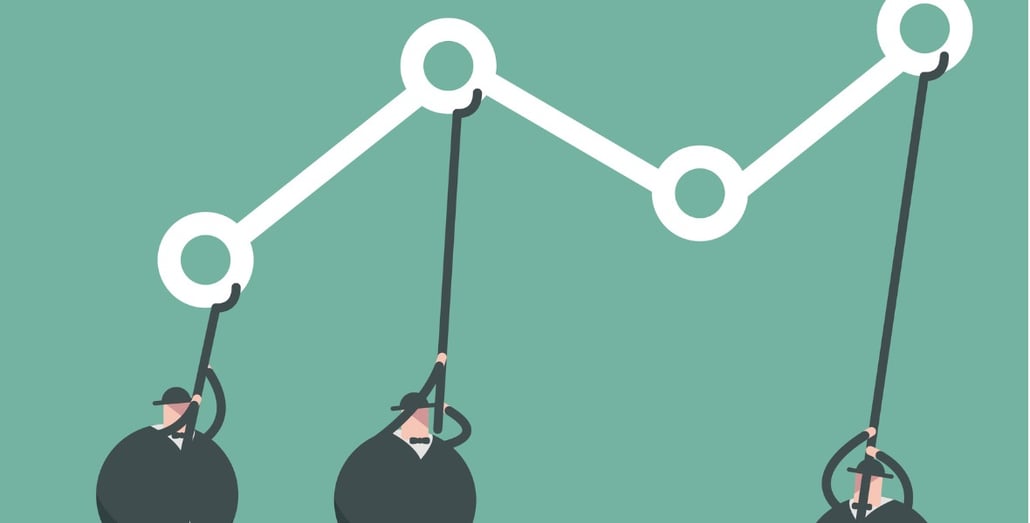 men-holding-up-graph-green