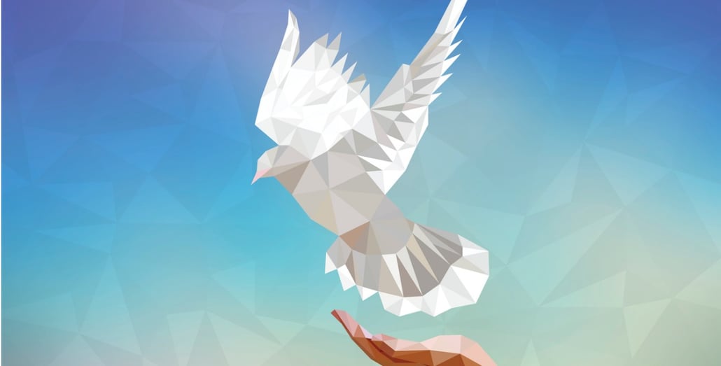 polygonal-dove-with-human-hand-flying-in-blue-sky-symbol-of-peace-vector-id686321846