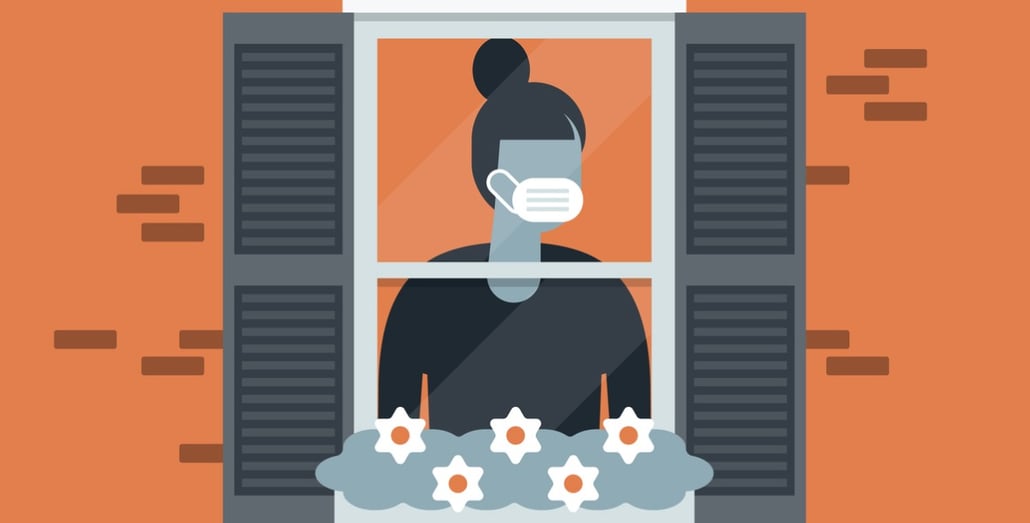 quarantined-young-woman-wearing-face-mask-and-looking-out-of-window